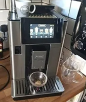 Máy Pha Cà Phê Tự Động DELONGHI ECAM 610.55.SB photo review